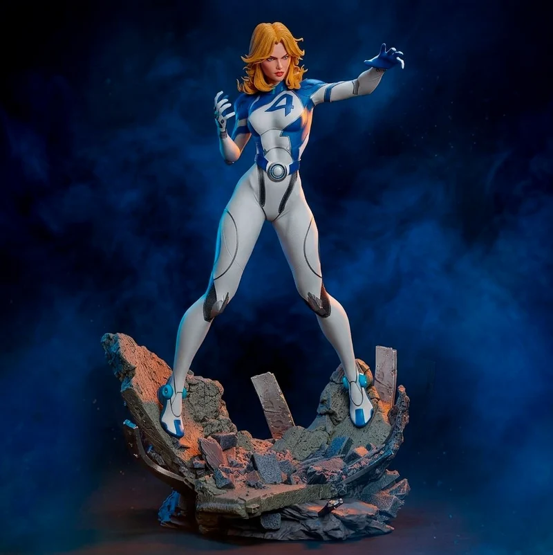 Invisible Woman in a Fantastic Four suit standing on a rubble base