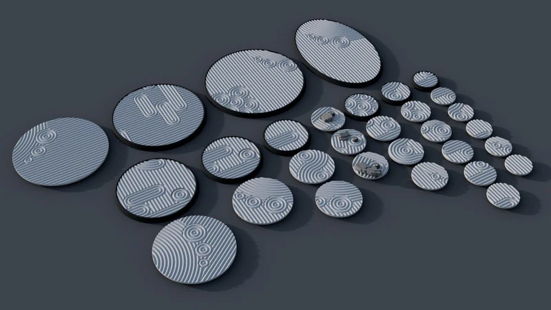 Round sci-fi discs with raised symbols and concentric line patterns in varied sizes