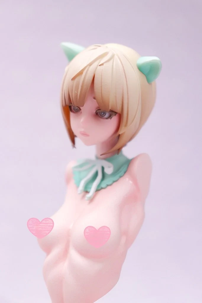 Stylized fox girl bust statue with blond hair, mint-green ears, and collar