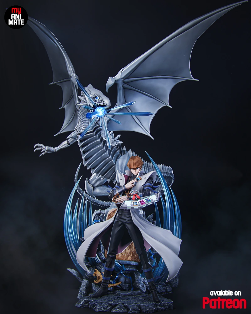 Blue-Eyes White Dragon and Seto Kaiba statue with wings, blue energy, and a rocky base