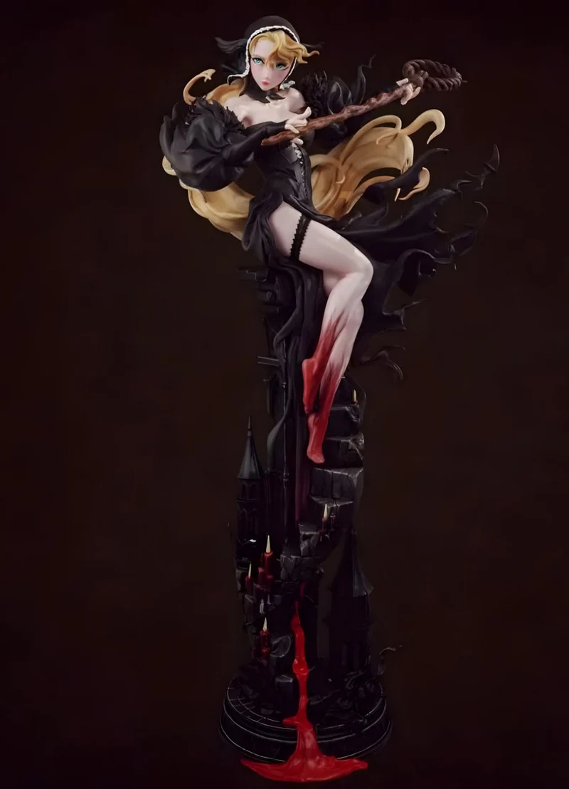 Marcille Donato fantasy witch statue with staff and flowing black costume on a dark pedestal