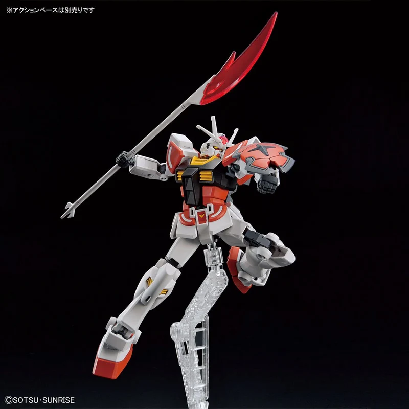 Gundam Mobile Suit model with red-bladed spear in an airborne pose
