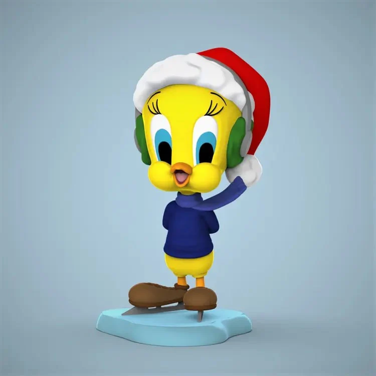 Tweety Looney Tunes figurine in a Santa hat, scarf, earmuffs, and skis