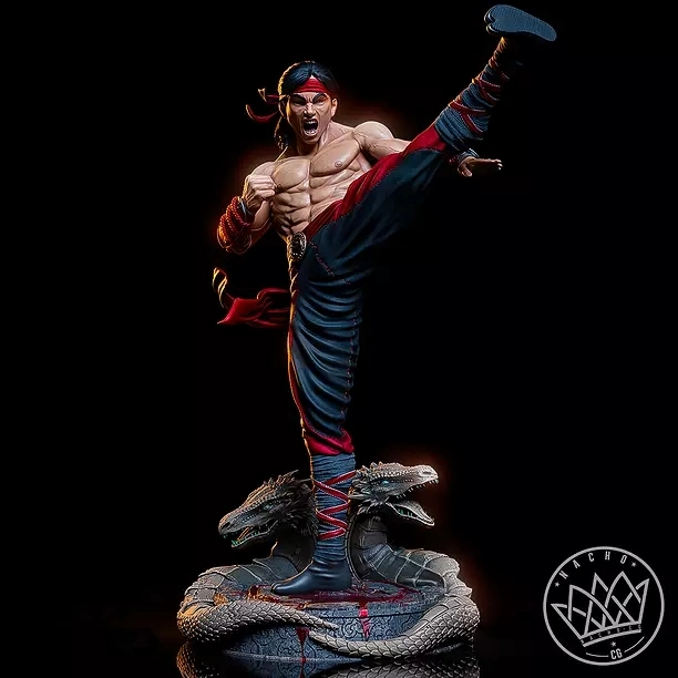 Liu Kang Mortal Kombat statue performing a high kick above a dragon base