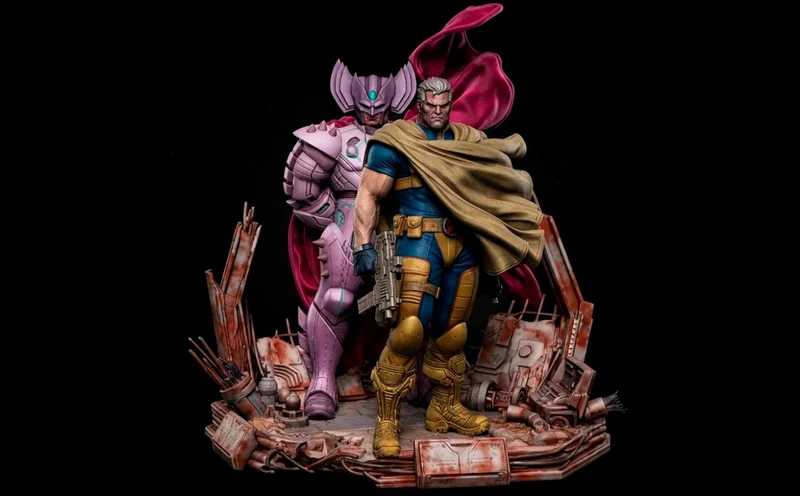 Cable and Stryfe Marvel diorama figures on a ruined battlefield base