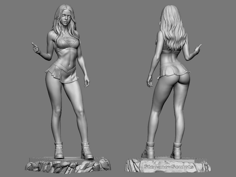 Supergirl DC Comics statue model with emblem, boots, and rocky base
