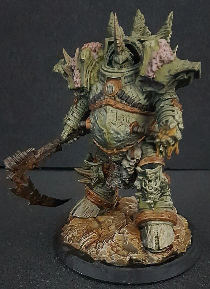 Typhus Warhammer 40,000 miniature with horned armor and a large scythe