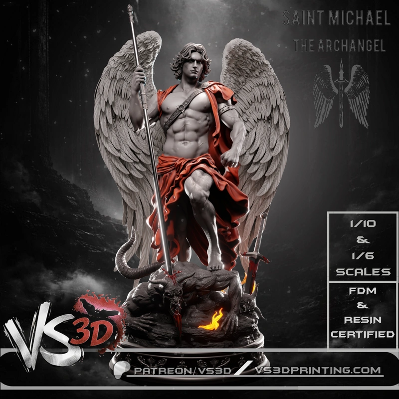 Saint Michael winged archangel statue holding a spear over a defeated creature