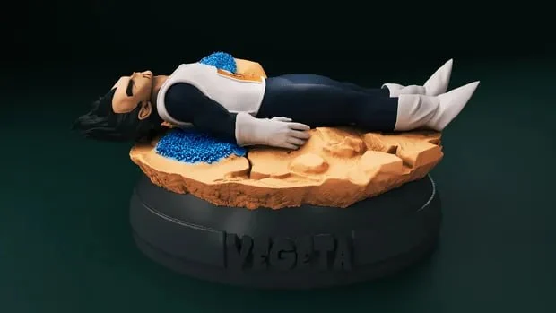Vegeta from Dragon Ball reclining on a rocky base with blue energy details