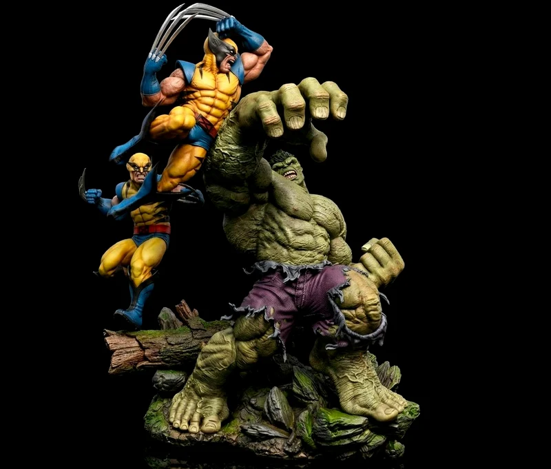 Marvel Wolverine and Hulk battle statue on a rugged rocky base