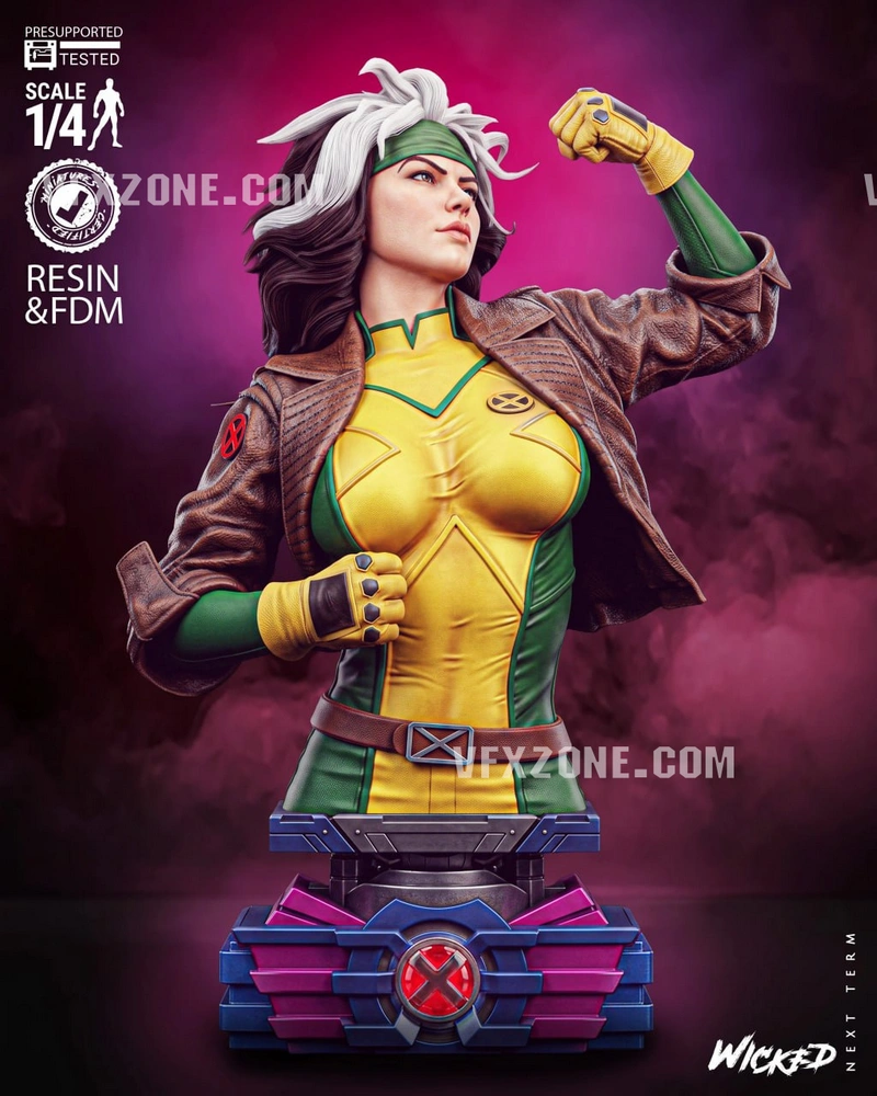 Marvel Rogue X-Men bust with white-streaked hair, green-and-yellow suit, and raised fist