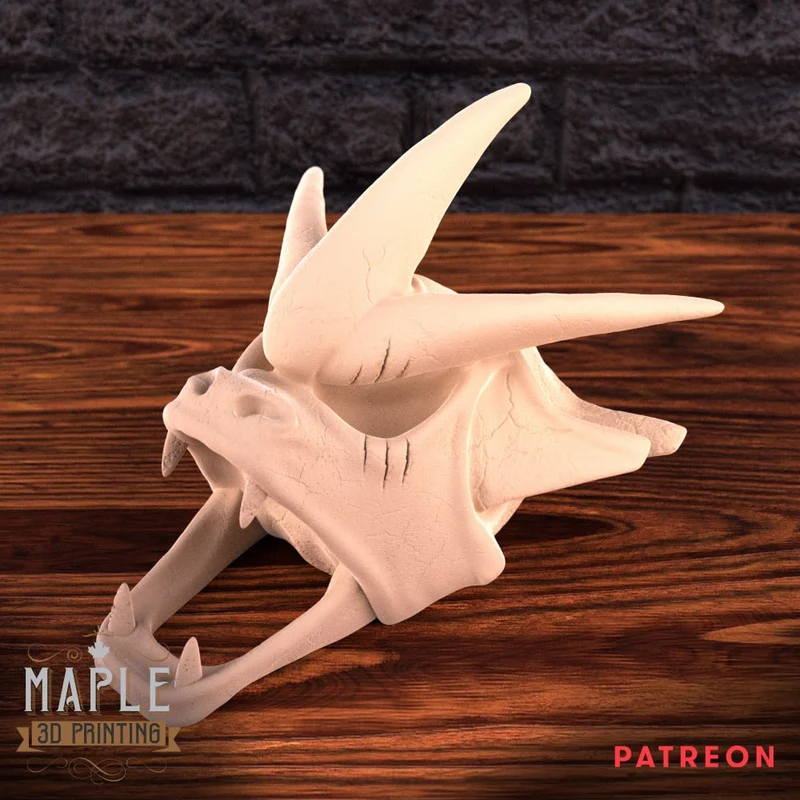 Stylized horned dragon skull 3D model on a wooden surface