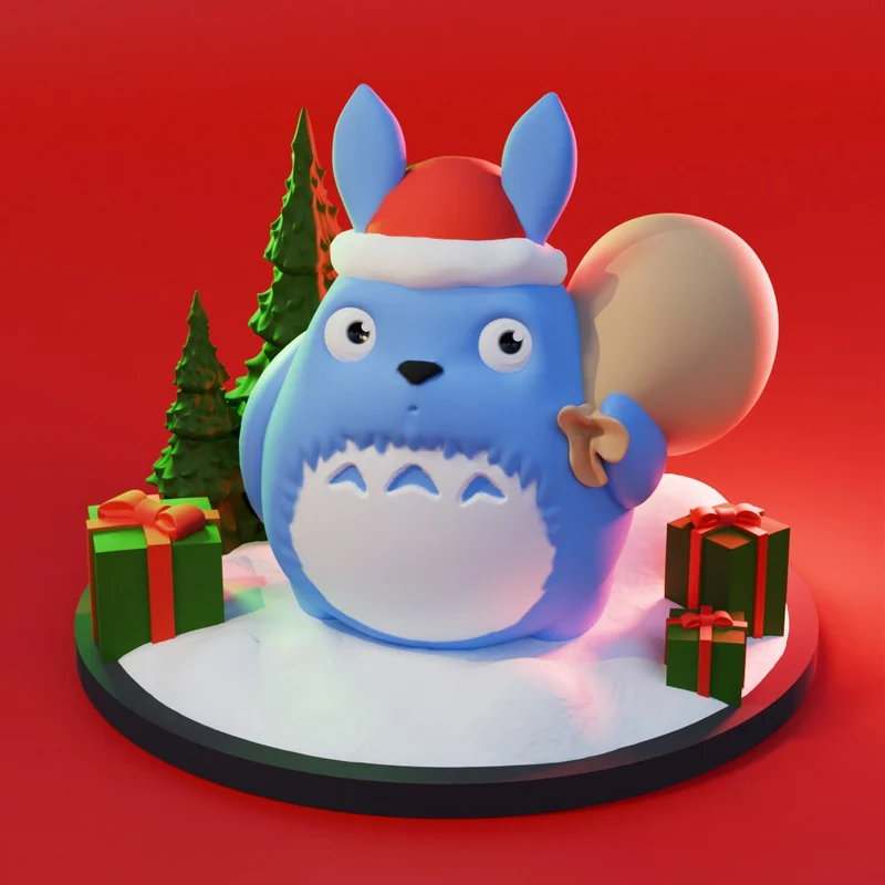 Blue Totoro wearing a Santa hat with a gift sack on a festive display base
