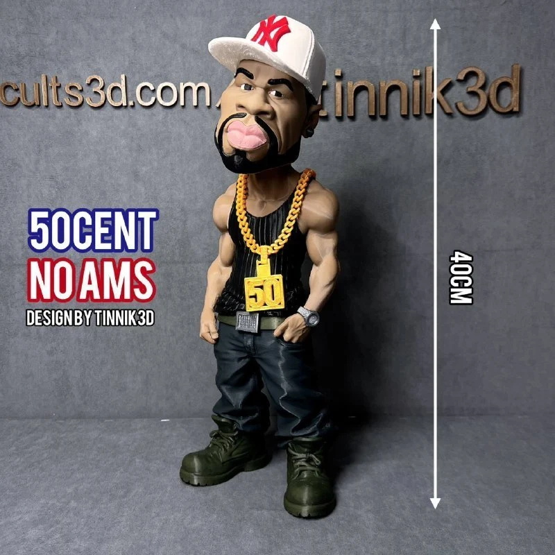 Stylized 50 Cent caricature figurine wearing a Yankees cap and gold chain