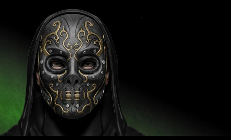 Harry Potter Death Eater mask with skull details, gold scrollwork, rivets, and eye openings