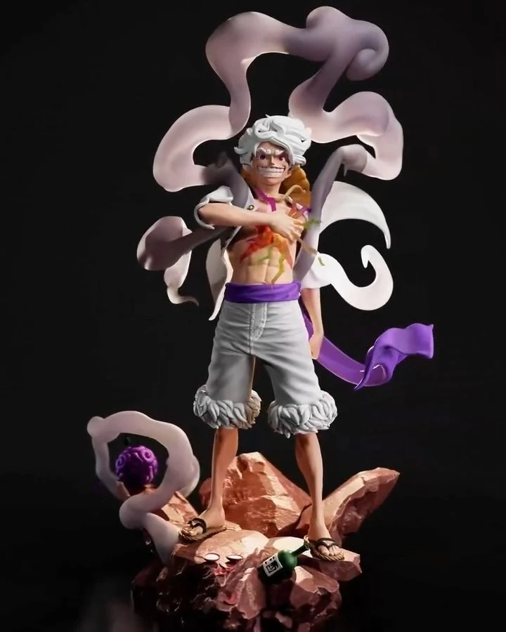 Monkey D. Luffy Gear 5 statue with white hair and flowing cloud forms