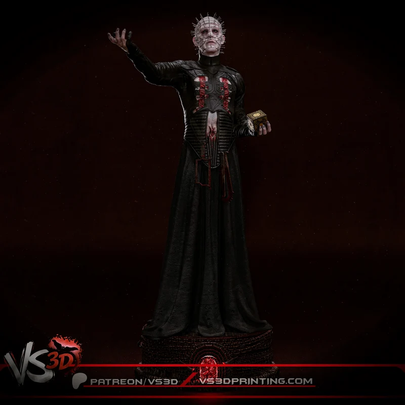 Pinhead Hellraiser statue with a pin-studded face, dark robe and puzzle box