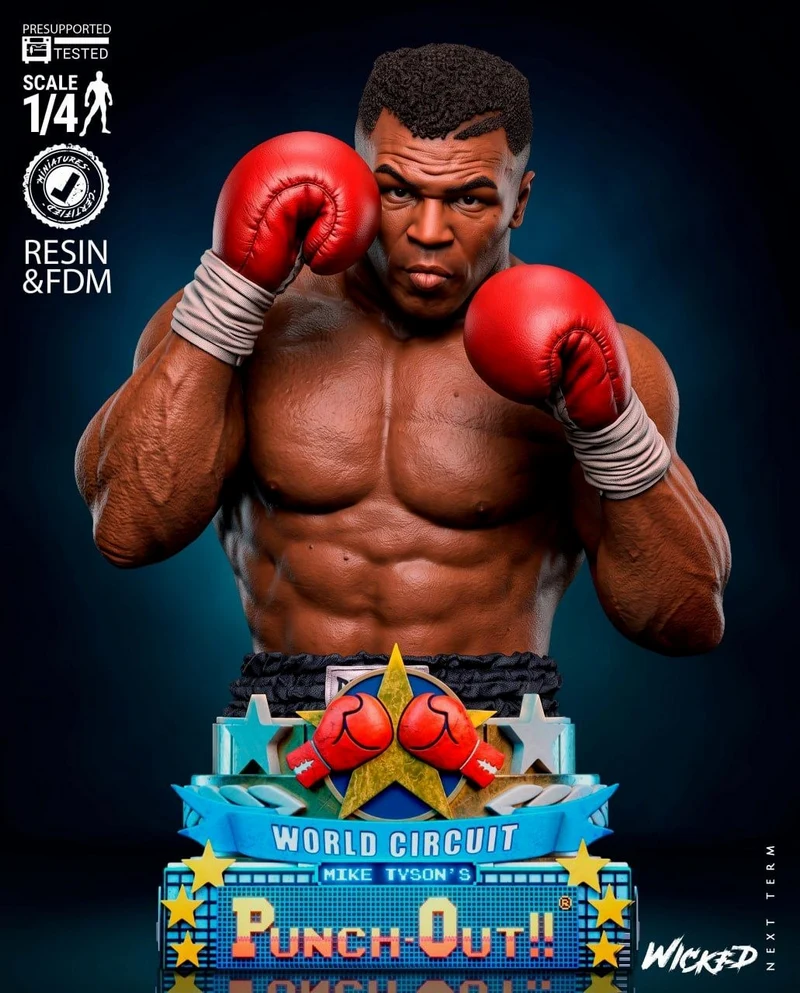 Mike Tyson boxing bust with red gloves on a Punch-Out!! display base