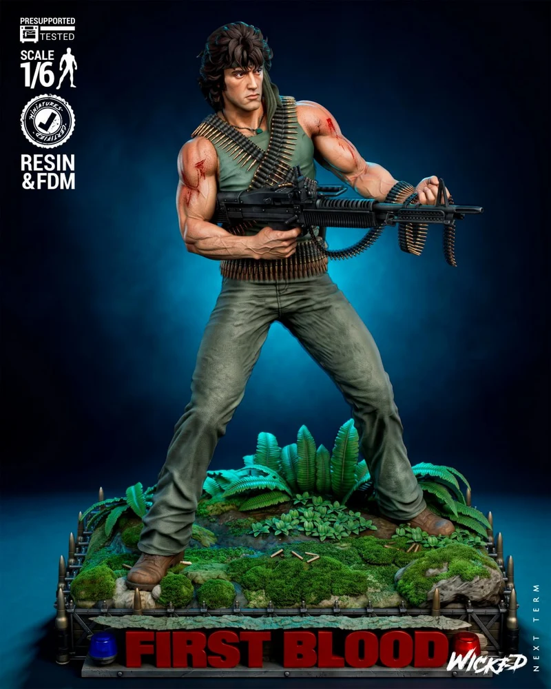 Rambo First Blood statue holding a rifle on a jungle-themed display base