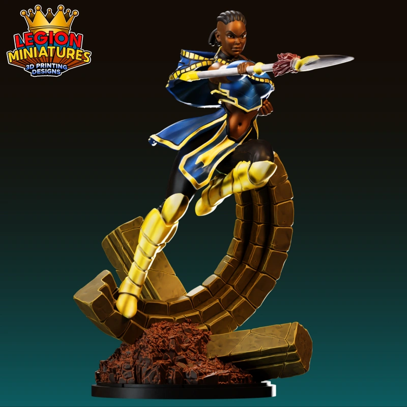 Shuri Marvel character statue with spear, blue-and-gold armor, and curved stone base